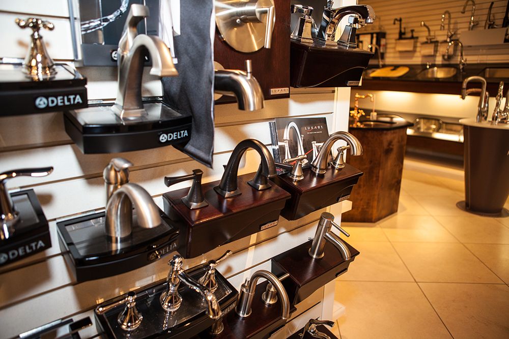 Shelf of kitchen sink faucets | bathroom and kitchen supply store Harleysville PA | Weinstein Collegeville