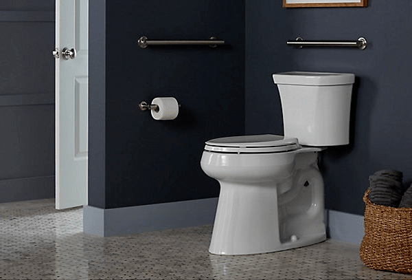 Kohler Highline Tall toilet in blue bathroom | Popular Kohler toilets | Weinstein Collegeville