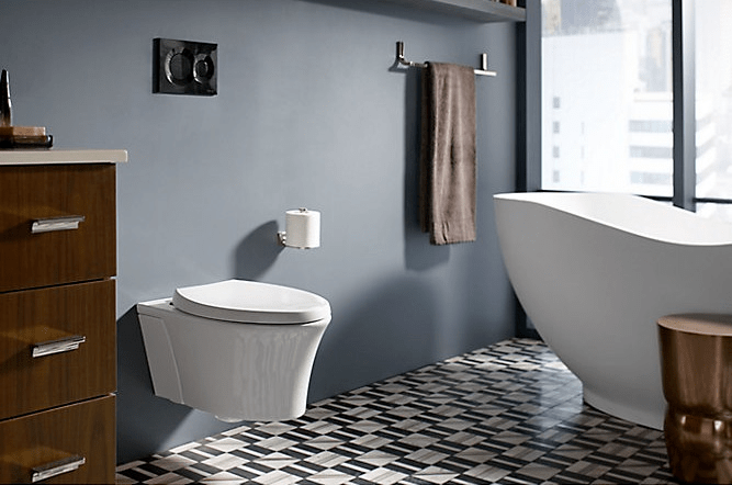 Kohler Veil wall-hung toilet near bathtub in bathroom | Popular Kohler toilets | Weinstein Collegeville